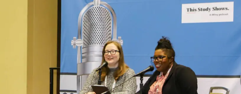 Two women speaking into microphones at the AAAS Annual Meeting